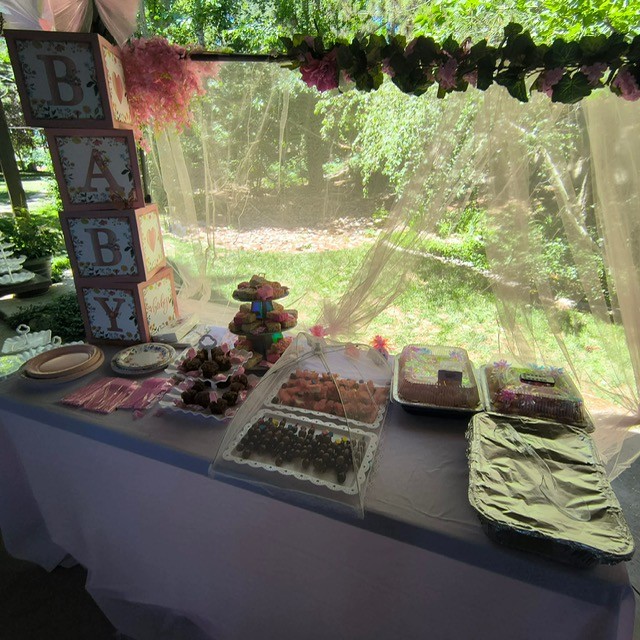 Decorated dessert table for a baby shower
