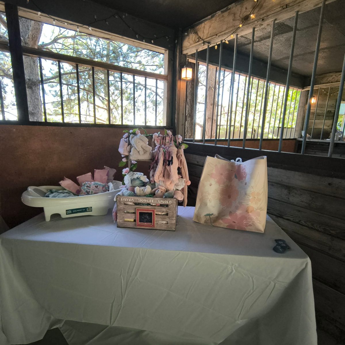 Baby shower gift table prepared for guests